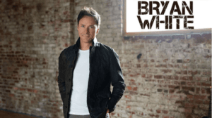 Bryan White in front of Brick wall